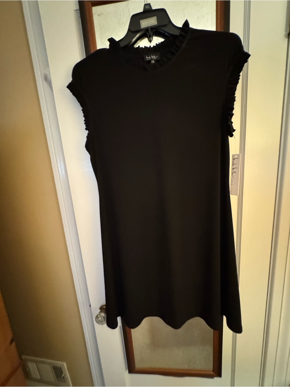 Nicole Miller Black Sleeveless Ruffle-Trim dress.